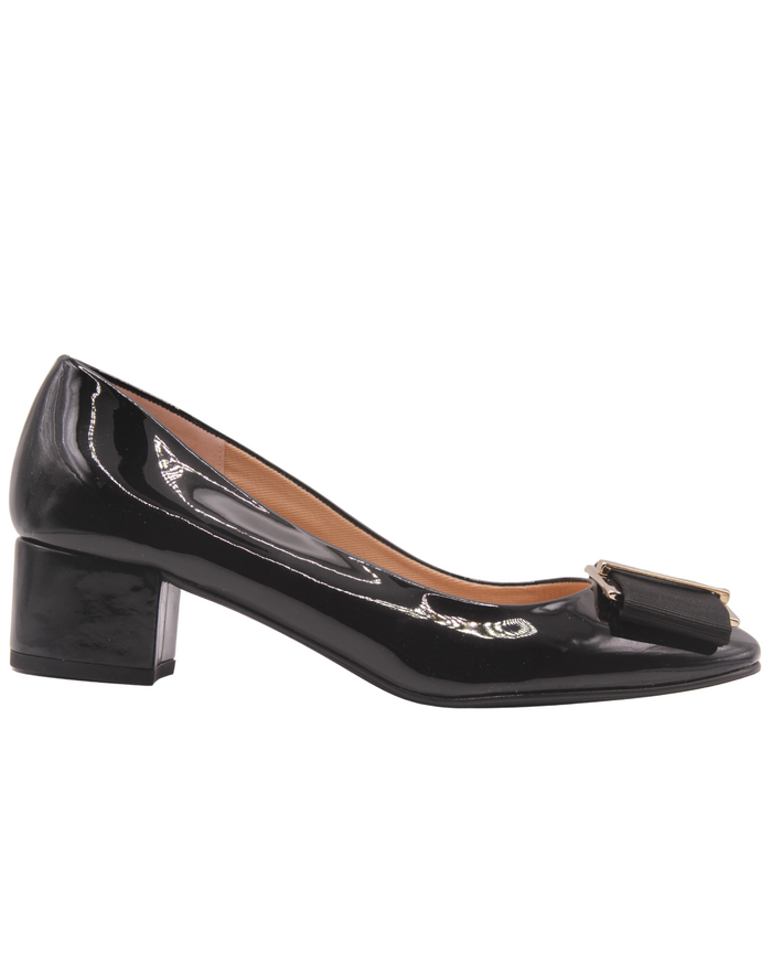 black patent low block heel with a gold metal and black grosgrain buckle detail on toe box square toe. - side view