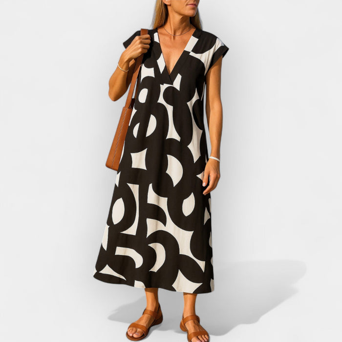 Airy Dress with V Neckline and Modern Design