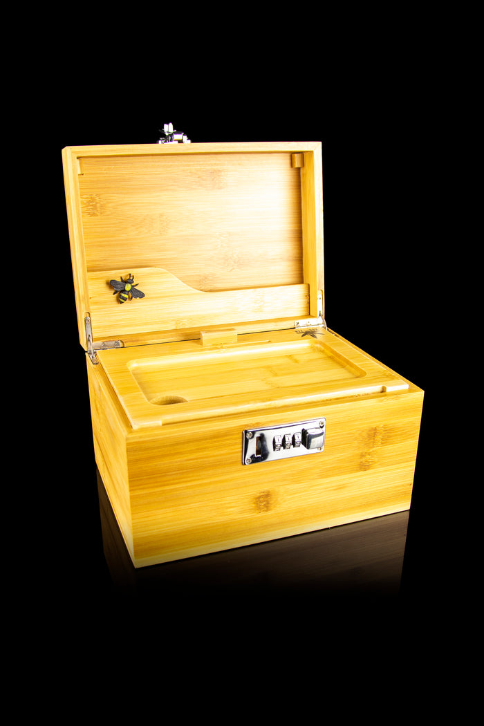 Wooden cannabis storage box with a combination lock and decorative bee.