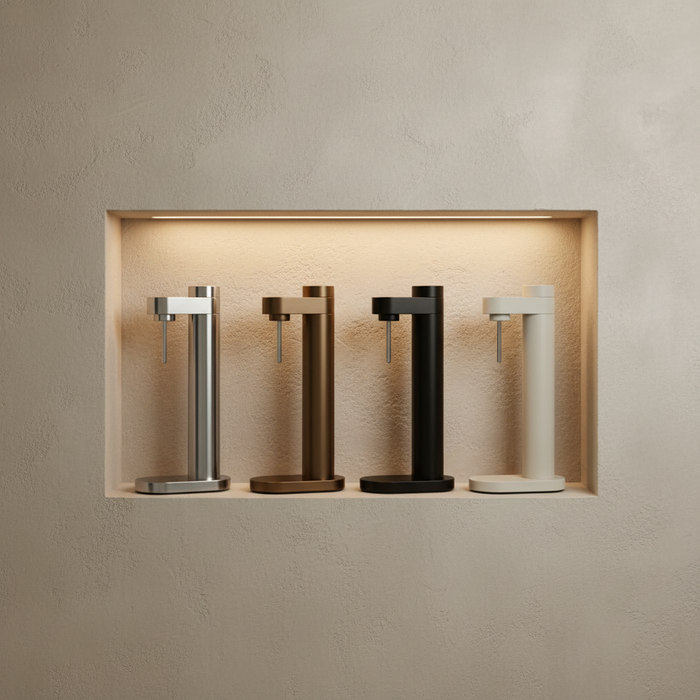 Brus Carbonator — Four Models in Limewash Niche