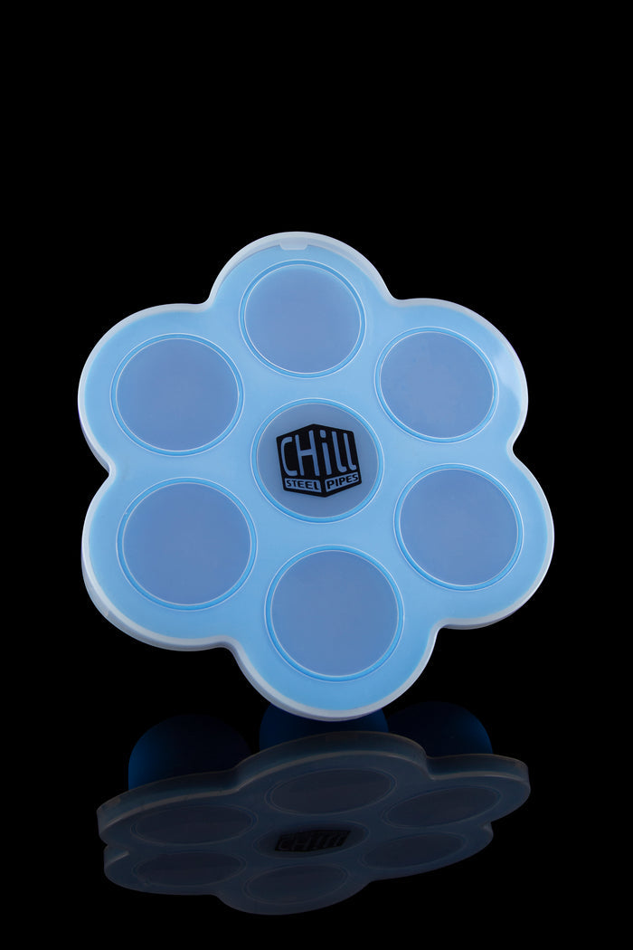 A top-down view of the Chill Steel Pipes Ice Cube Tray, showing a blue silicone mold with multiple cube-shaped compartments.