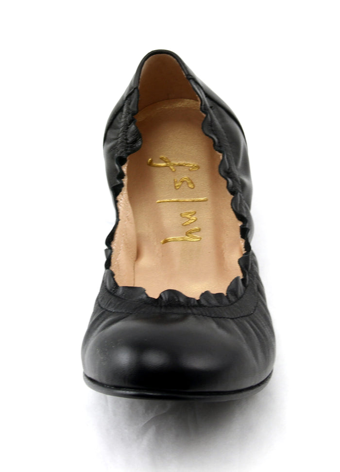 black leather ballet flat with a rounded toe and elasticated topline. top view