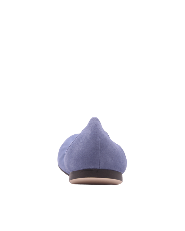 blue suede ballet flat with a rounded toe and elasticated topline. back view