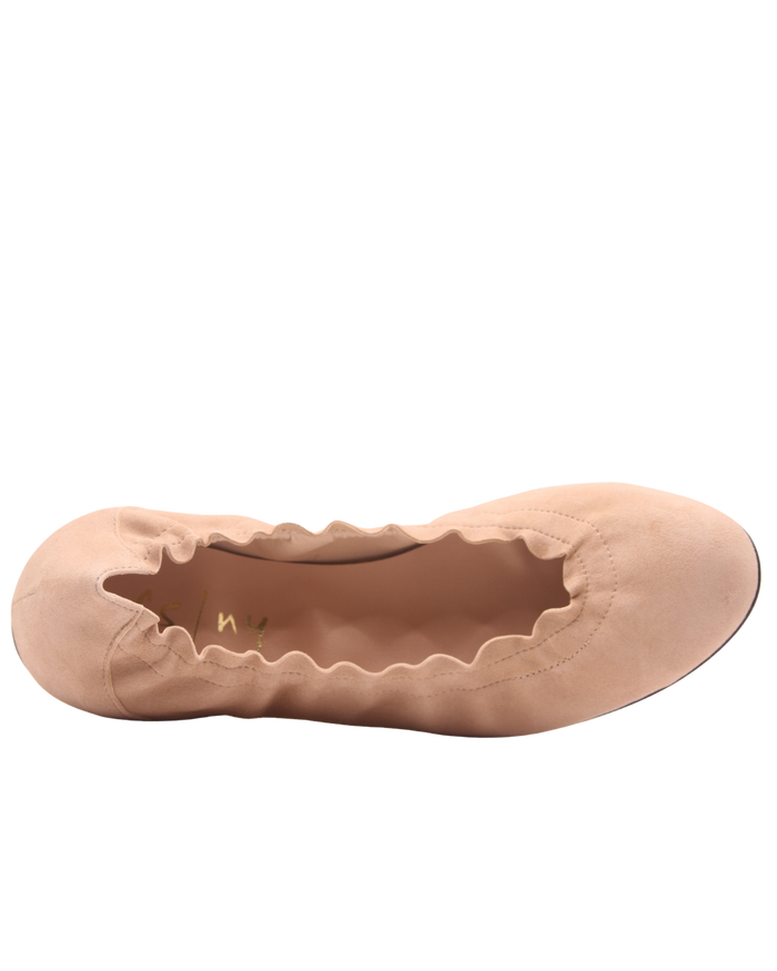 nude suede ballet flat with a rounded toe and elasticated topline top view