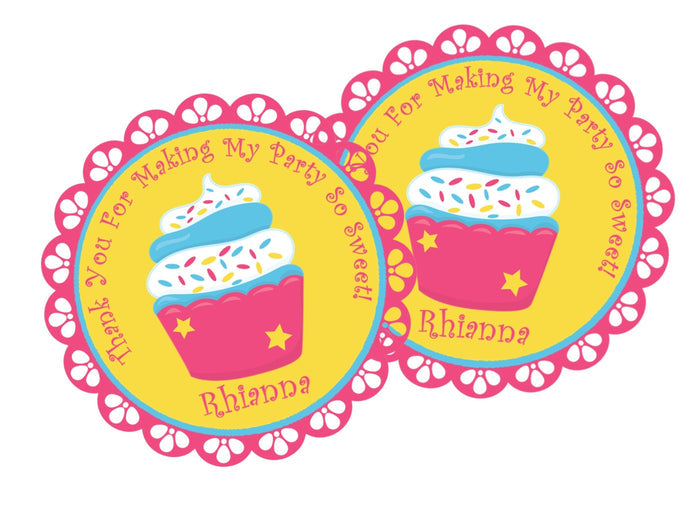 Bright cupcake birthday sticker with pink and blue frosting