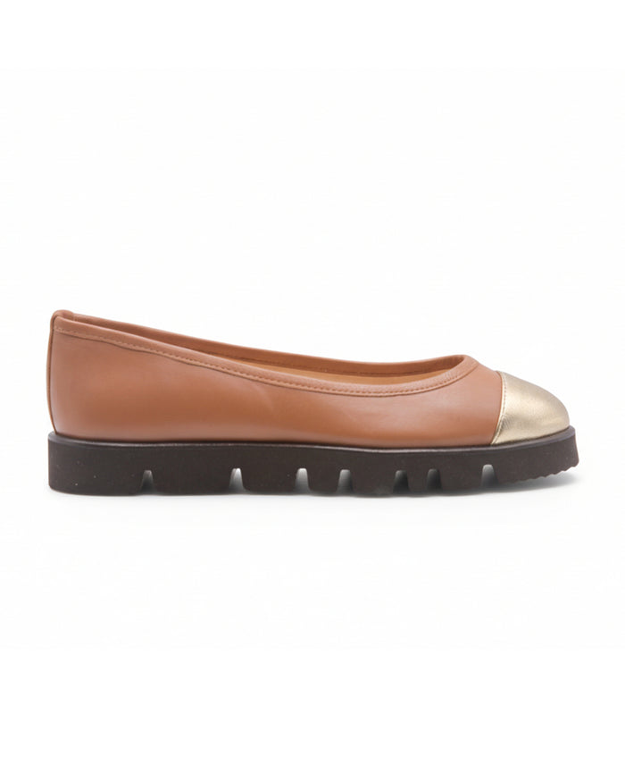 cognac leather flat with a rounded toe, contrasting BRONZE leather cap toe, and a thick treaded sole side view