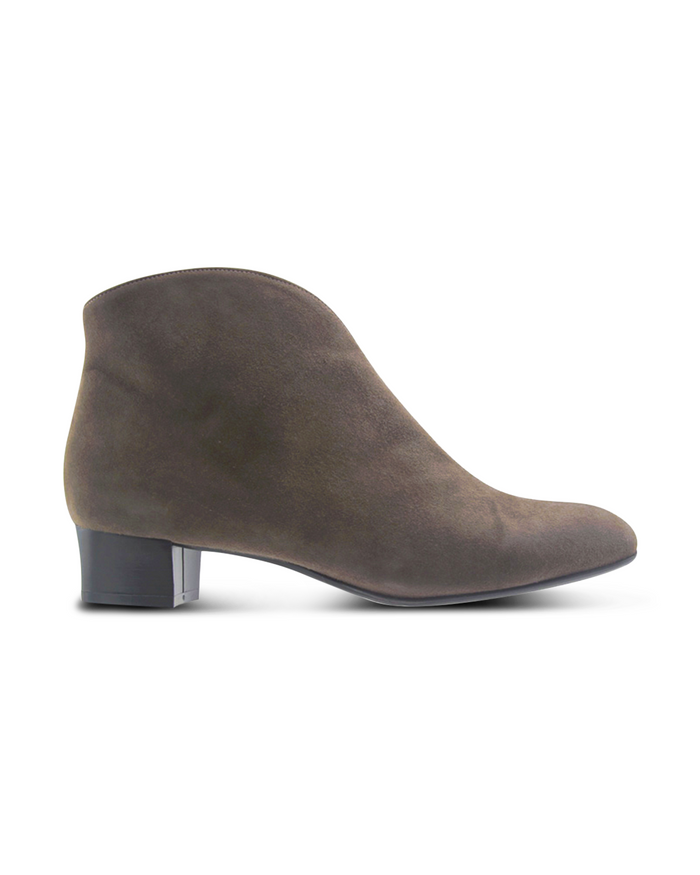 Grey suede ankle boot with a low block heel and a smooth, minimal silhouette. Side View