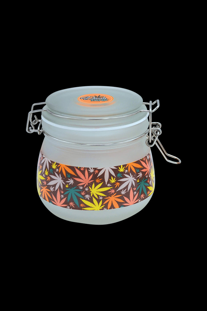 A side view of the Fujima Multicolor Hemp Frosted Glass Jar, featuring a clamp lid and colorful hemp-inspired design.