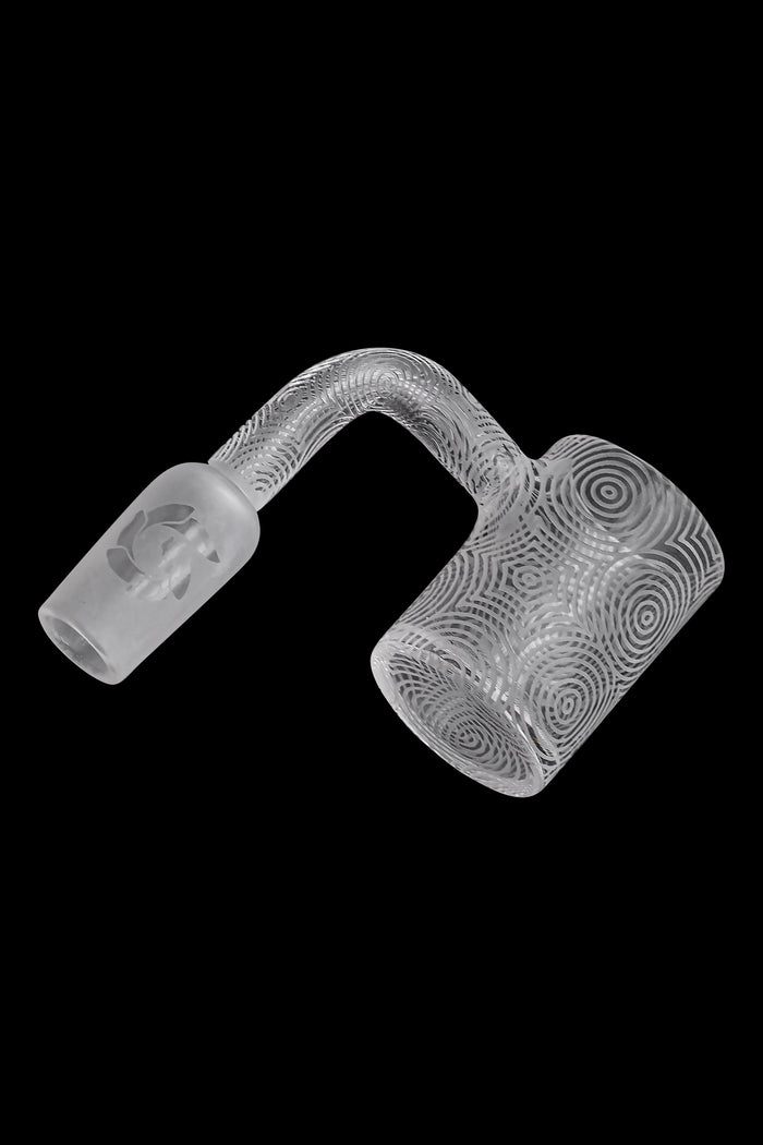 Frosted glass cannabis dab rig nail with intricate swirling patterns and a floral design.
