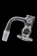 Clear glass dab rig with etched logo and rounded base.