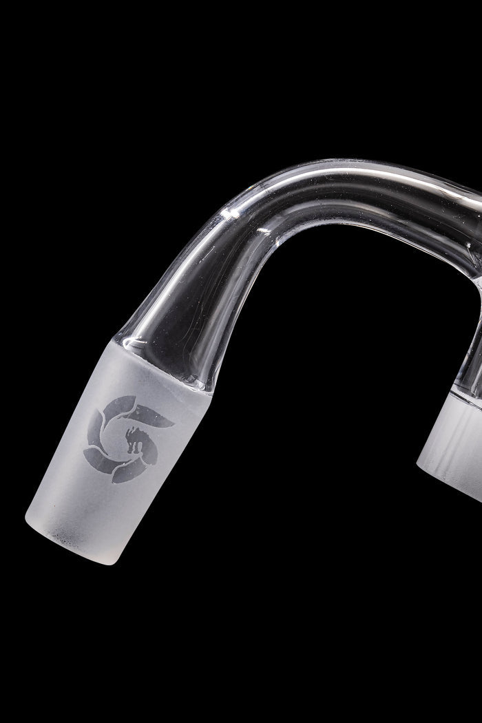 Clear glass bubbler with etched design against a black background.