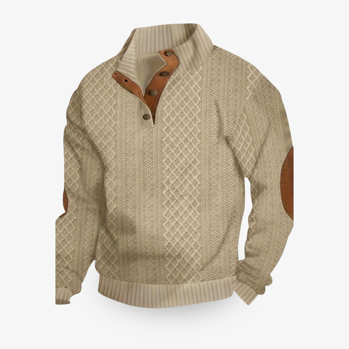 Veste en tricot gris pour homme avec motif à losanges, coudières marron, col montant, manches longues. Mode masculine élégante et moderne.