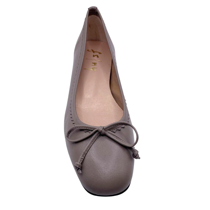 cappuccino leather ballet flat with a rounded toe, leather trim on top line, and a small bow on the front. - top view