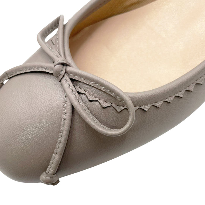 grey leather bow close up