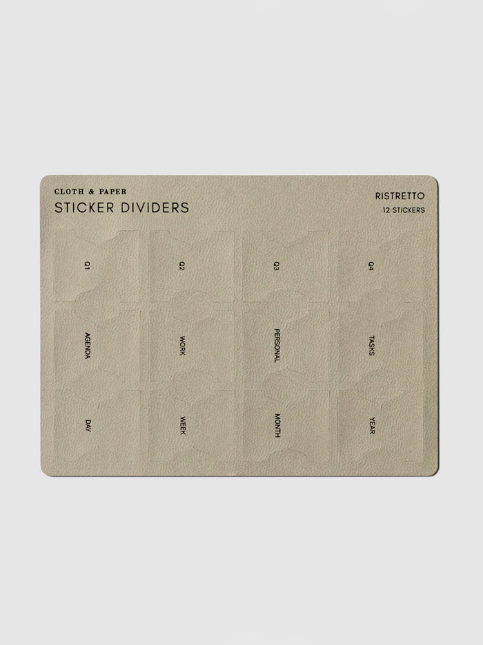 Leather Sticker Dividers, Cloth and Paper. Dividers displayed in their packaging on a neutral background.
