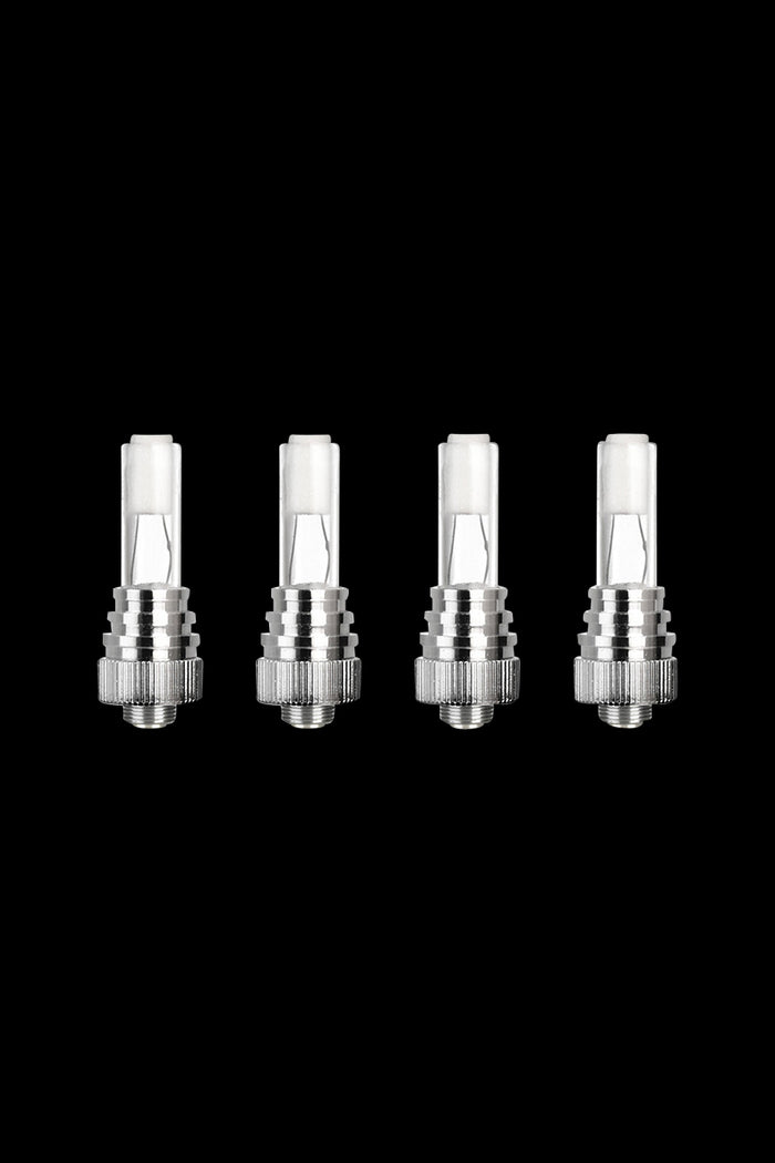 A close-up of the four Lookah Seahorse Quartz See-Through Coils, showcasing their clear design and metallic threading.