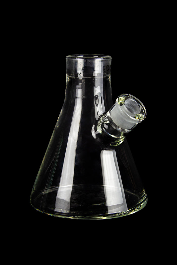 Clear glass beaker-style water pipe with a glass downstem, isolated on a black background.