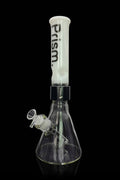 Glass bong with ice catch and removable downstem against a black background.
