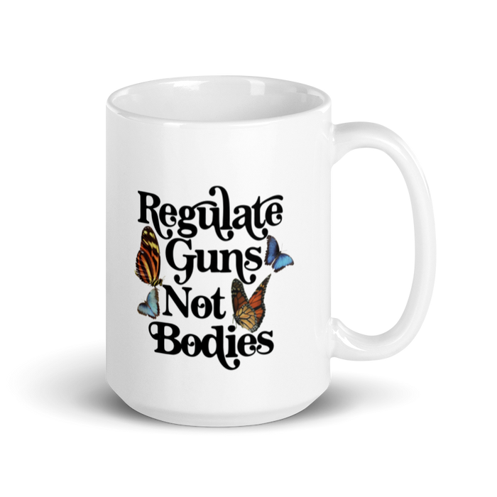 Regulate Guns Not Bodies Mug