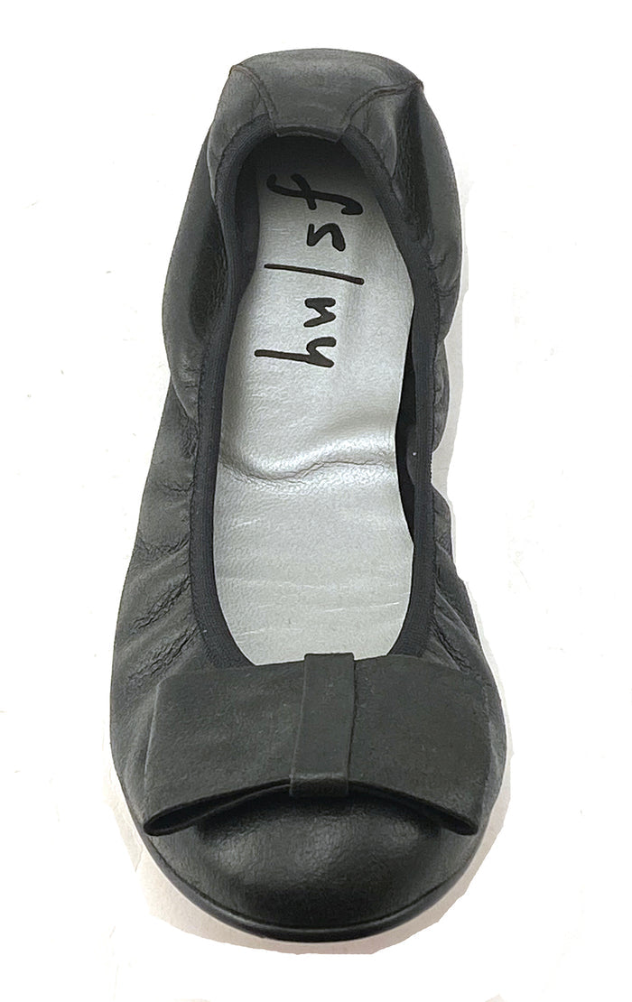 black metallic leather ballet flat with a rounded toe and a large folded bow accent on the front. top view