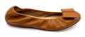 Brown leather ballet flat with a rounded toe and a large folded bow accent on the front. Side View