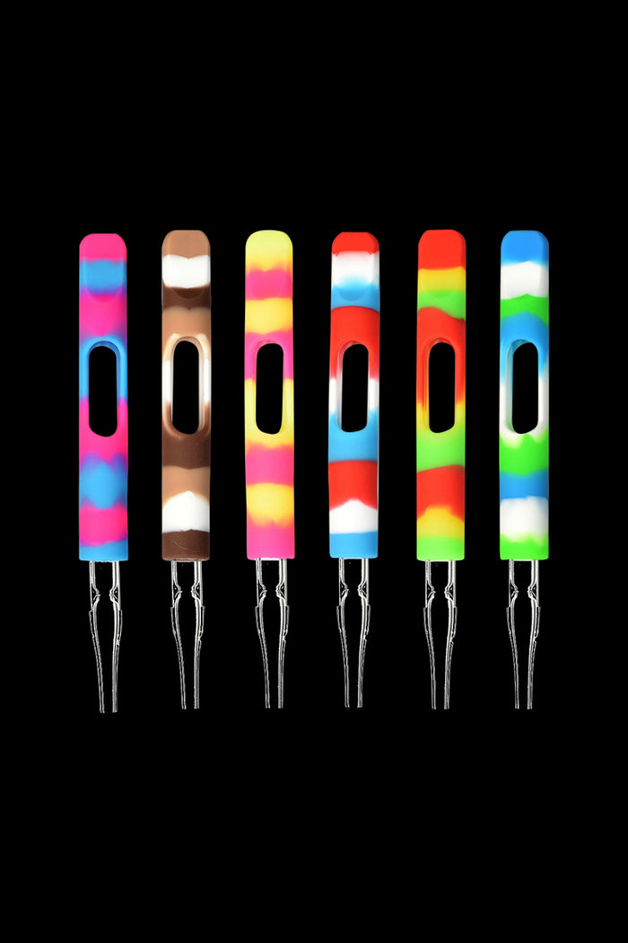 Top-down view of six colorful Silicone Wrapped Dab Straw with Glass Tip pieces in assorted striped patterns aligned evenly on a black background