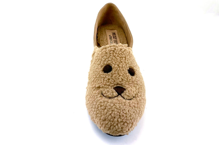 Beige suede loafer with a textured teddy-fleece upper featuring stitched teddy bear face outline top viw